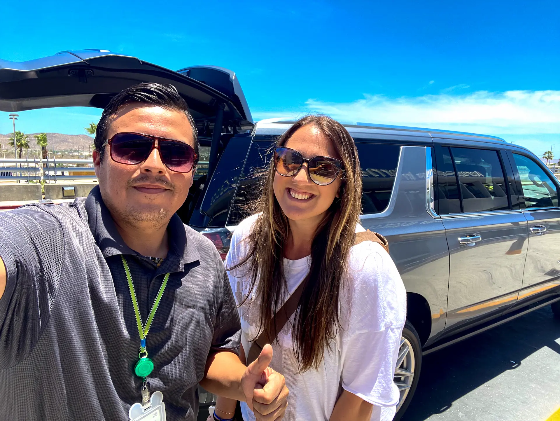Man Smiling With Woman thumbs up.