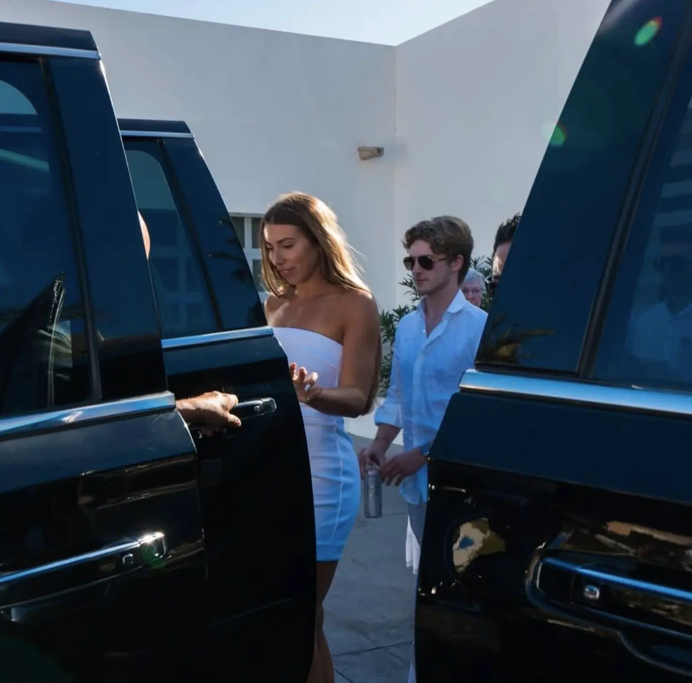 Cabo Airport Shuttle Wedding Service Couple Arrival on Van White Dressed